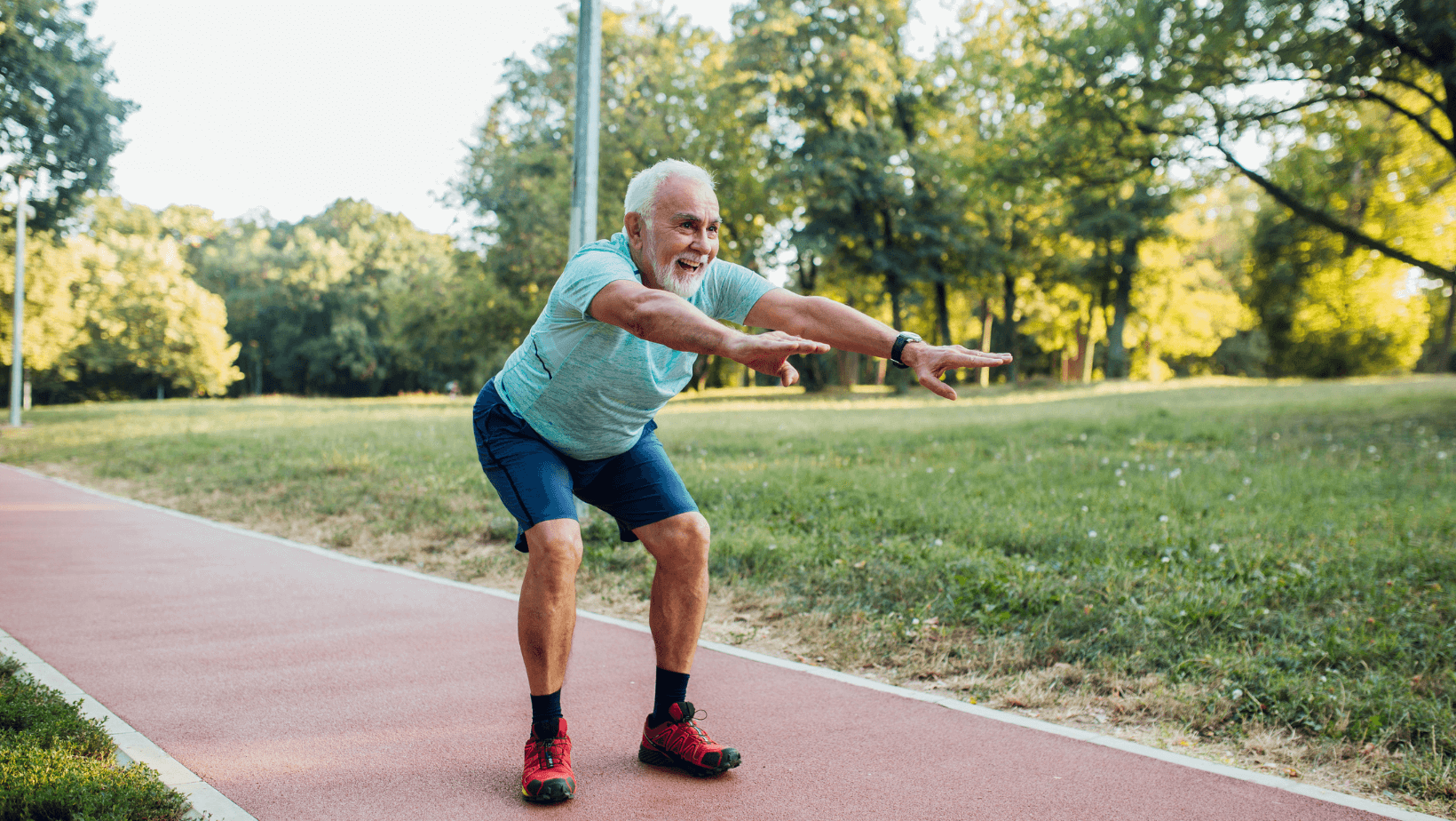 An older man doing squats outside